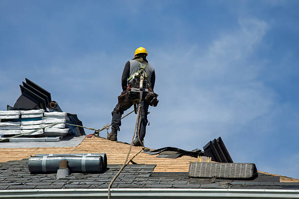 Professional Roof Replacement technician working in Effingham, NH